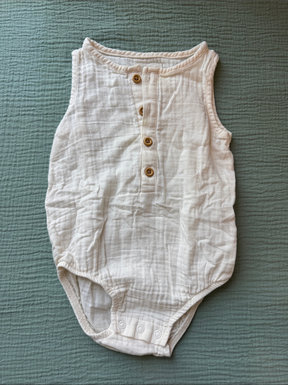 Neutral Cream Sleeveless Muslin Baby One-Piece Bodysuit